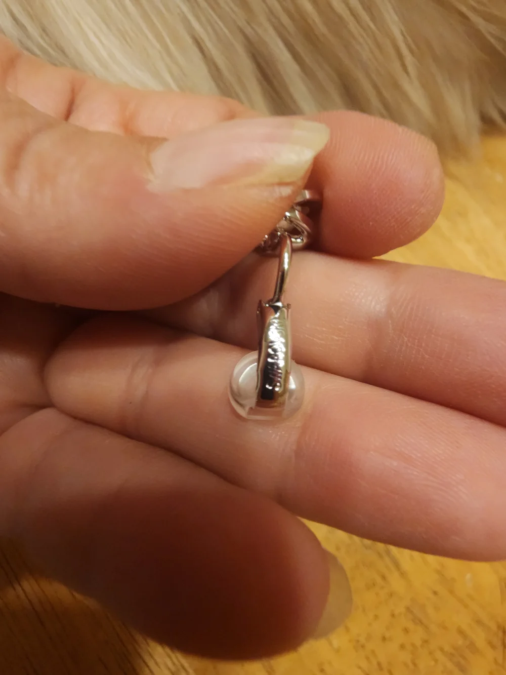 classic Swarovski Crystal Pearl clip ons featuring a central cream faux pearl